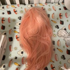 Long pastel pink lace front wig